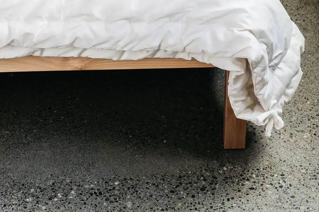 The perfect option to carry you through all four seasons.Two comforters, each slightly lighter than our Light weight, joined together with cotton ties at the corners and on the sides. Tie the layers together in colder weather, separate them as the temperature warms. Fits insidea duvet cover with ease. Designed and handcrafted for comfort, warmth, and coziness, our quilted comforters are made from domestically sourced premium eco wool encased in an organic cotton sateen shell.