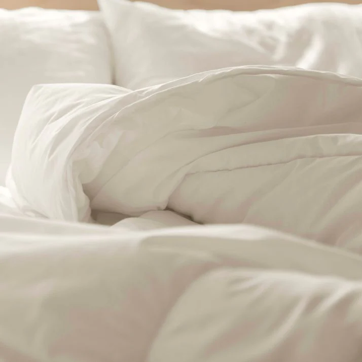 We tapped into the transformative power of nature to enhance the softness and warmth of premium organic cotton. We brush our thick and weighty flannel repeatedly to create an incredibly soft hand that keeps you exceptionally warm. Each duvet cover is self-backed and finished with a simple knife-edge. Secure to your insert using the interior flap, ties, and hidden coconut shell buttons.