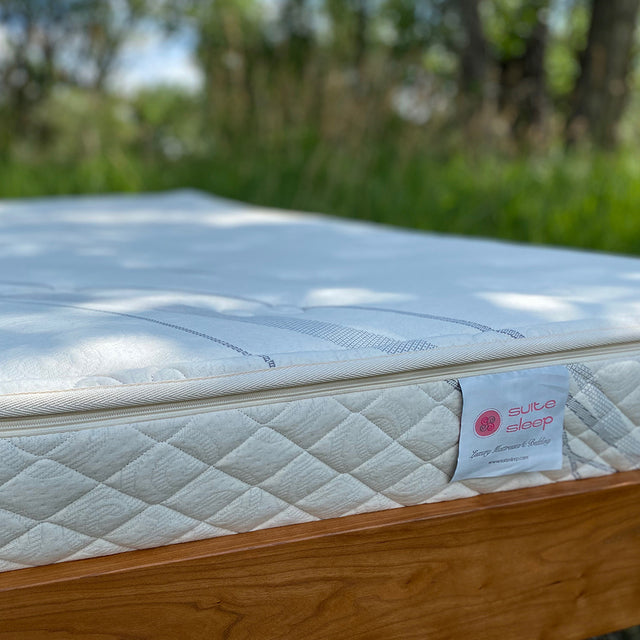 The 7" Suite Essentials Mattress is the perfect base layer to any of our luxurious toppers or as firm stand alone support for back sleepers and children.
Surrounded with quilted layers of wool and encased in an organic cotton stretch knit fabric, this mattress provides wonderful pressure point relief in an extremely durable and resilient natural material.
This mattress offers a customizable 6" core, which can be tailored to your specific sleep needs.