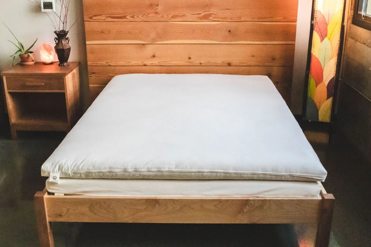 The Shikibuton is a traditional Japanese mattress that's lightweight and versatile. Our version of the Shikibuton is an all-natural, healthy sleeping option.
Because of its lightweight, flexible design, you can easily fold it up and store in a closet when not in use. This versatility allows you to maximize sleeping space with minimal impact. A great, low-profile choice for a tiny house, studio apartment, extra guest accommodation, or anywhere you need to save some space.
Made with a 3" natural latex core