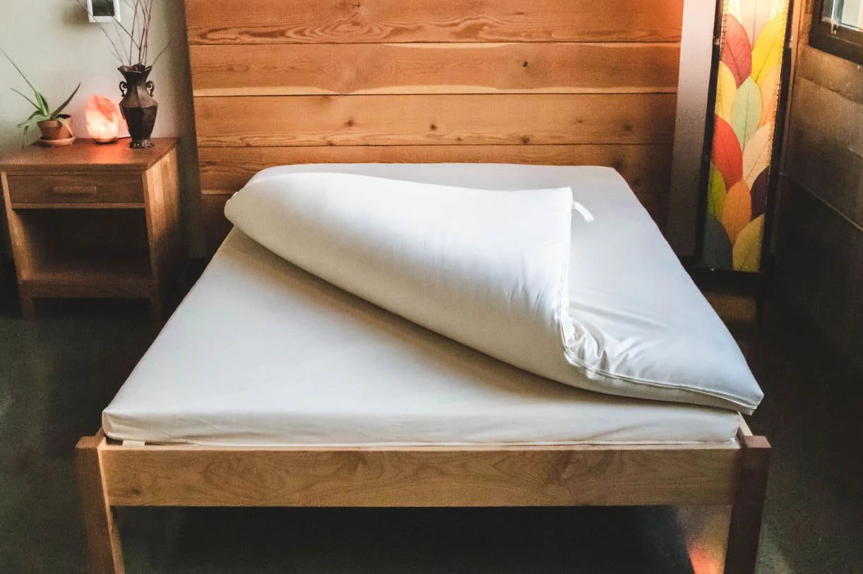 The Shikibuton is a traditional Japanese mattress that's lightweight and versatile. Our version of the Shikibuton is an all-natural, healthy sleeping option.
Because of its lightweight, flexible design, you can easily fold it up and store in a closet when not in use. This versatility allows you to maximize sleeping space with minimal impact. A great, low-profile choice for a tiny house, studio apartment, extra guest accommodation, or anywhere you need to save some space.
Made with a 3" natural latex core