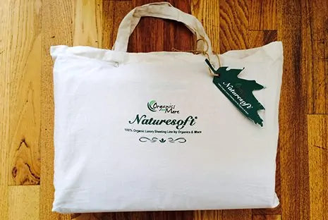 Discover the simple charm and comfort of our Naturesoft Organic Sheets, woven from 200 thread count cotton sateen available in classic ivory or white. Crafted from 100% GOTS certified organic cotton, these sheets strike the perfect balance between quality and affordability. Designed to fit a range of mattresses with a 16″ pocket depth, they ensure a snug and secure fit. Each set is detailed with a tasteful three-inch hem at the top and a half-inch hem around the sides and bottom for a clean, finished look.