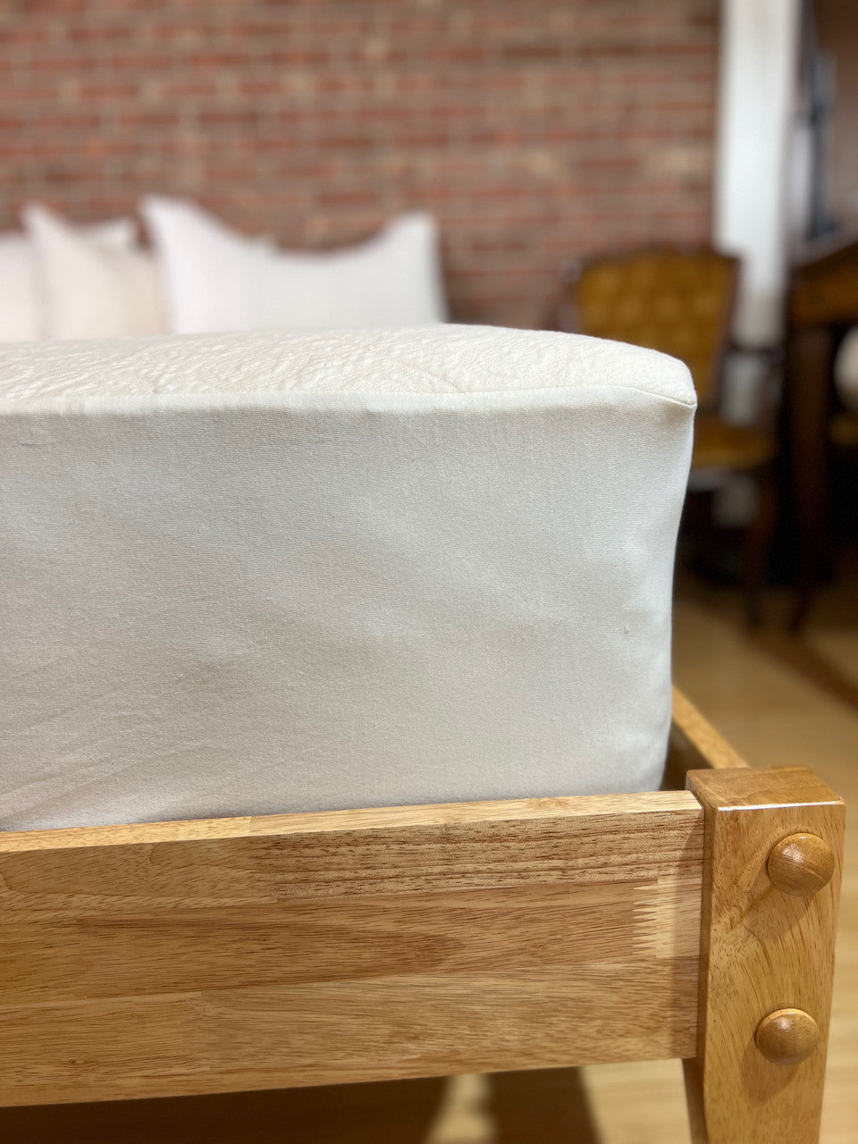 The Organic Cotton Knit protector is made using our soft double knit mattress ticking which uses 100% certified organic cotton fabric. It provides a layer of protection to any mattress that uses a stretch knit cover without minimizing the feel and pressure-point release. The organic knit protector is skirted with organic cotton knit jersey and features an 18" pocket. It will keep your mattress looking newer longer and is so soft and supple you won't want to put a sheet over it. Made in the USA using importe