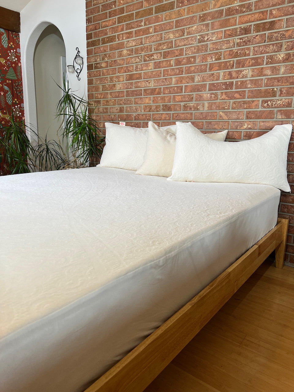 The Organic Cotton Knit protector is made using our soft double knit mattress ticking which uses 100% certified organic cotton fabric. It provides a layer of protection to any mattress that uses a stretch knit cover without minimizing the feel and pressure-point release. The organic knit protector is skirted with organic cotton knit jersey and features an 18" pocket. It will keep your mattress looking newer longer and is so soft and supple you won't want to put a sheet over it. Made in the USA using importe