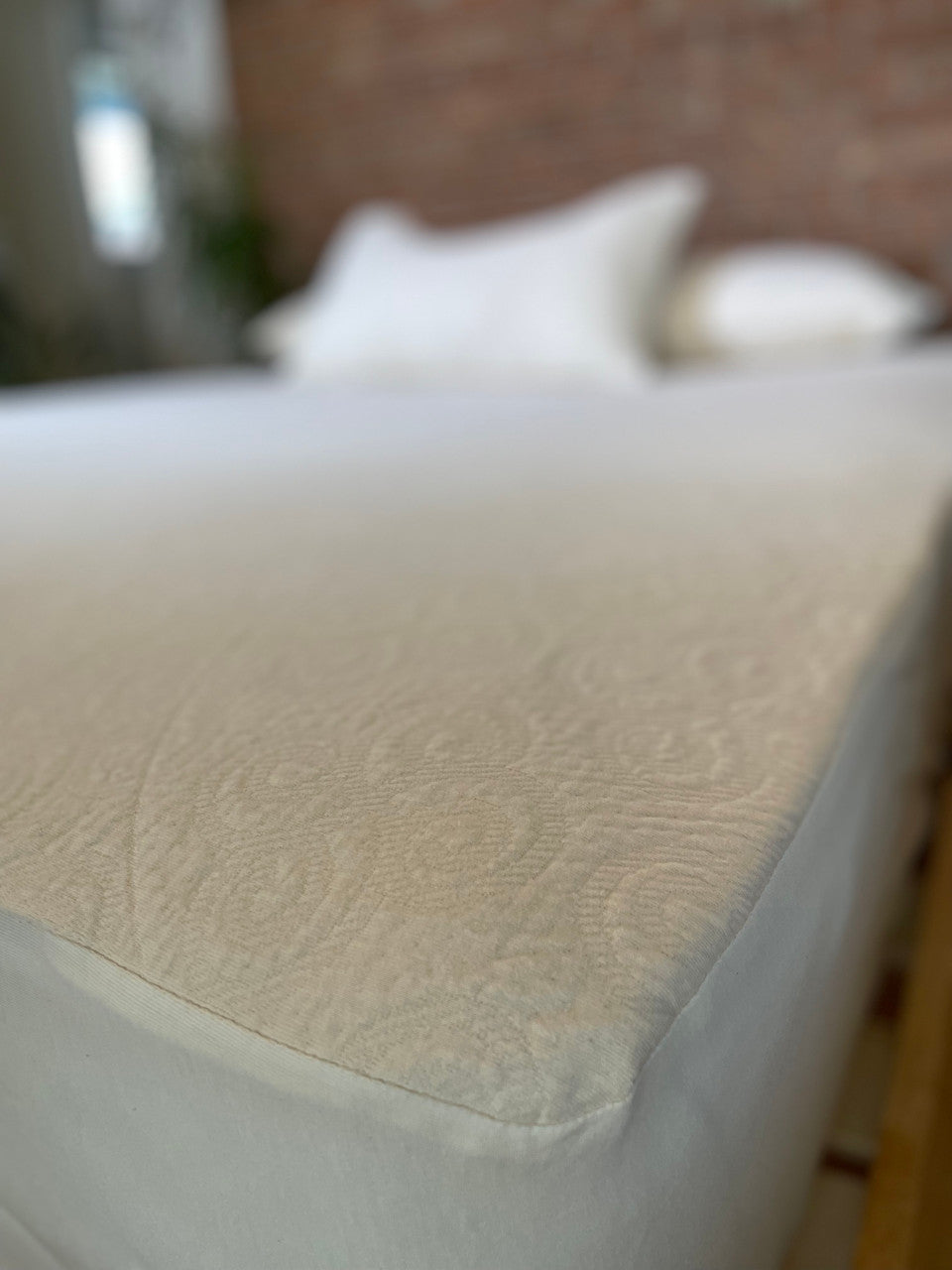 The Organic Cotton Knit protector is made using our soft double knit mattress ticking which uses 100% certified organic cotton fabric. It provides a layer of protection to any mattress that uses a stretch knit cover without minimizing the feel and pressure-point release. The organic knit protector is skirted with organic cotton knit jersey and features an 18" pocket. It will keep your mattress looking newer longer and is so soft and supple you won't want to put a sheet over it. Made in the USA using importe