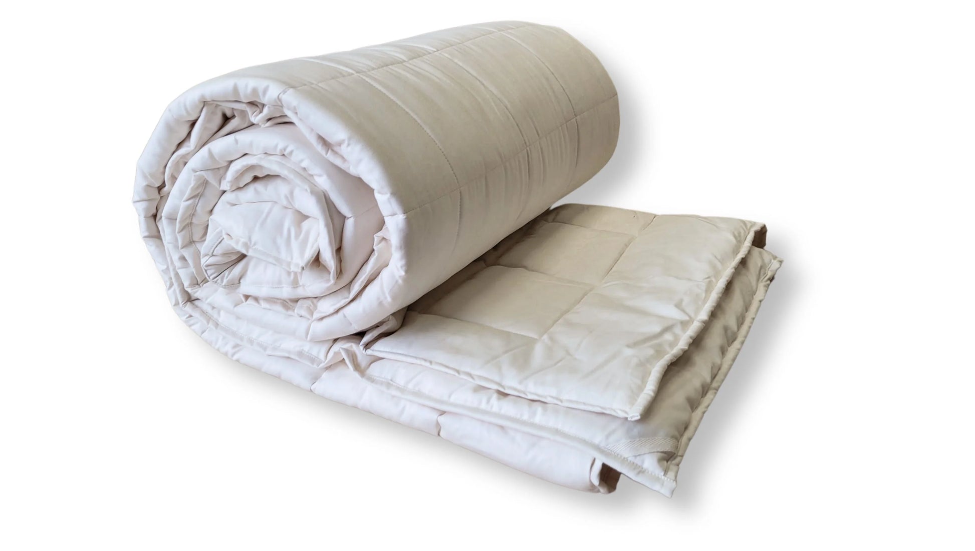 Soaring Heart's quilted organic cotton comforter is designed and crafted for our customers to achieve a restful sleep. The inner filling is made from our blend of certified organic cotton, and encased in a GOTS certified cotton fabric. The artisan quilting pattern keeps everything in place and makes this comforter extremely durable. This comforter is recommended for someone who sleeps cold, or prefers a more weighted comforter.