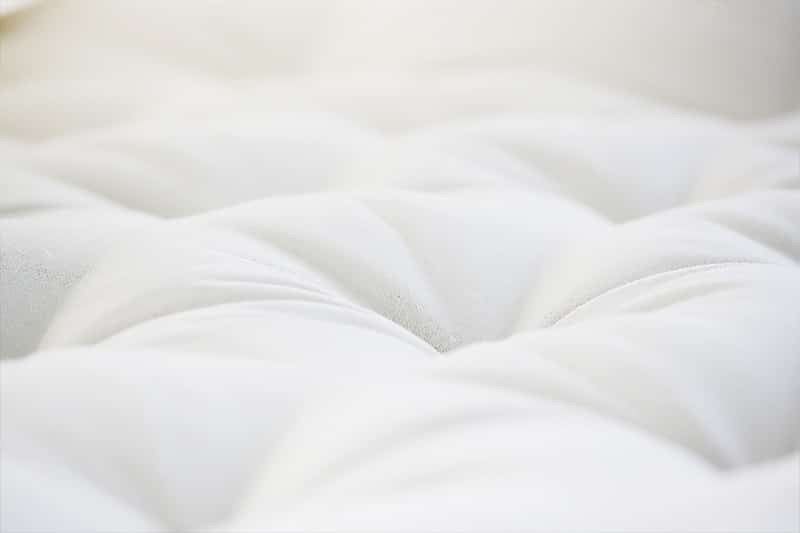An organic wool mattress hand-made to order
The Pastoral is filled with organic wool batting inside a tufted organic cotton cover. It does not contain latex. The organic wool fiber is resilient, supportive, and promotes a cooler, drier sleep environment. The Pastoral is flexible enough to serve as a futon. Each is handmade and tufted with natural linen thread.