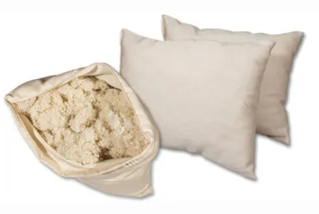 This pillow is made from small natural wool fluffs that stick to each other. You can move around the soft little balls of wool to shape it however it will best fit your neck and head. For example you can squish it around to create a thicker roll to support your neck and an indentation for your head or just a level surface. Comes with a zipper so you can add or remove filling. Can be ordered in three thicknesses, this is one of our most versatile pillows!