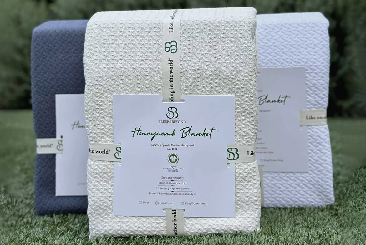 Wrap yourself in comfort with our exquisitely crafted blanket featuring a timeless jacquard weave. Made from GOTS certified 100% cotton, this weighty and durable blanket is not only pleasingly substantial but also free of harmful chemicals and dyes, ensuring a safe and cozy sleep experience. Its substantial texture provides warmth and comfort, making it ideal for use throughout all four seasons. Available in three elegant color options, this blanket effortlessly complements any bedroom decor, adding a touch