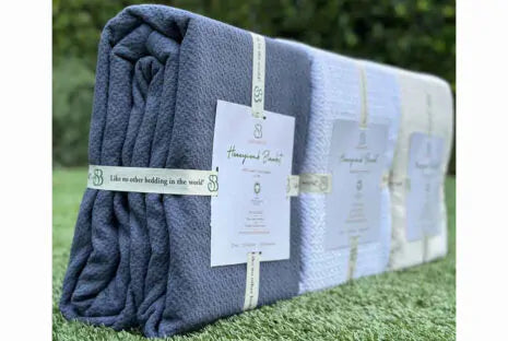 Wrap yourself in comfort with our exquisitely crafted blanket featuring a timeless jacquard weave. Made from GOTS certified 100% cotton, this weighty and durable blanket is not only pleasingly substantial but also free of harmful chemicals and dyes, ensuring a safe and cozy sleep experience. Its substantial texture provides warmth and comfort, making it ideal for use throughout all four seasons. Available in three elegant color options, this blanket effortlessly complements any bedroom decor, adding a touch