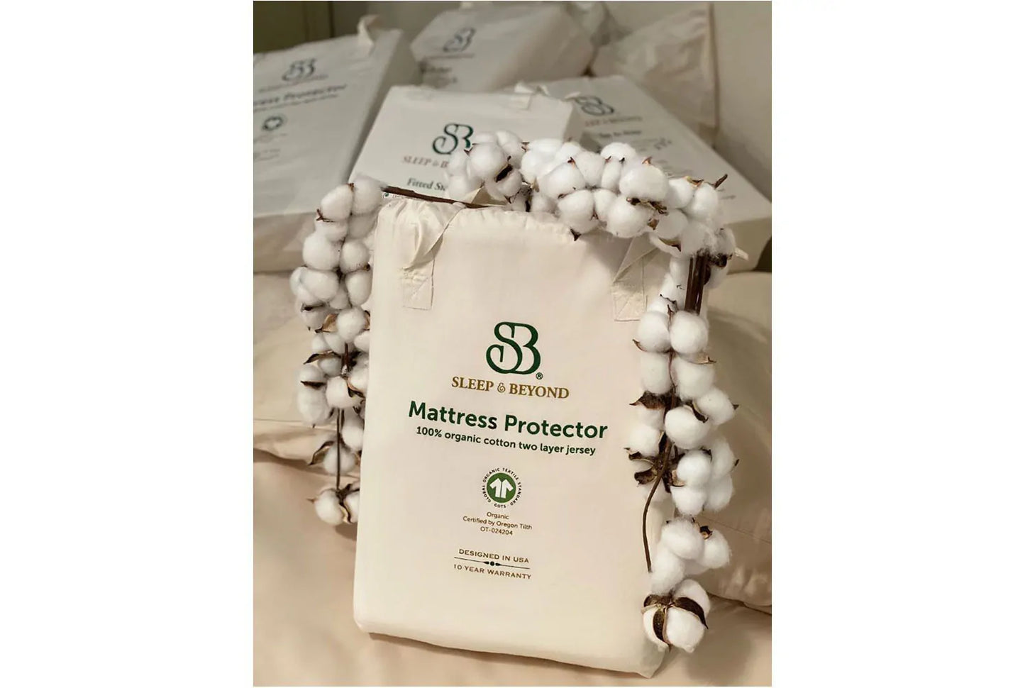 Keep your mattress pristine with Sleep and Beyond’s Organic Cotton Waterproof Mattress Protector, certified by GOTS, Fair Trade, and Oeko-Tex for unparalleled eco-friendliness. Crafted from two layers of soft 100% organic cotton jersey, encasing a proprietary waterproof TPU coating, this protector offers comprehensive protection—100% waterproof on the top and sides against spills, stains, dust mites, and bacteria. Designed for mattresses up to 18 inches, it’s lightweight and easy to change, ensuring a clean