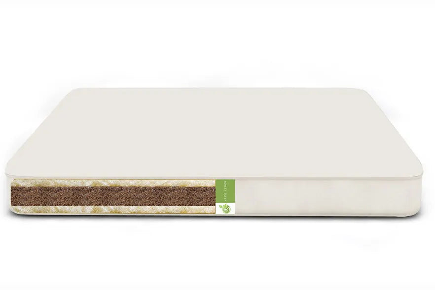 The Organic Sweetpea Crib Mattress by TFS Honest Sleep is an extra firm 6″ crib mattress. Made from organic dunlop latex, organic coconut coir, and organic wool surrounded by organic cotton fabric. It is constructed as a two sided crib mattress with a firmer side for infants (with the coconut coir side up, this is extra firm) and a softer side for toddlers (with the latex side up, this is considered firm).