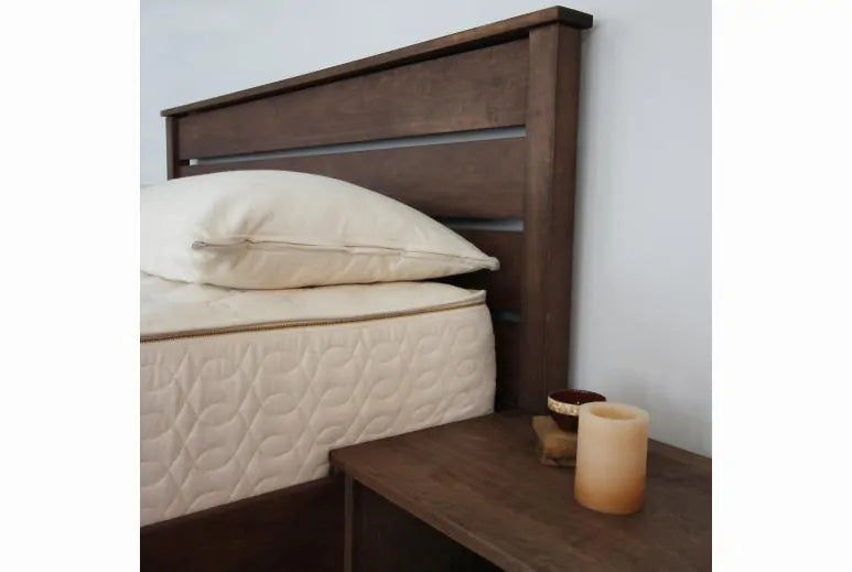 Your dream natural platform bed is here.
Hand-built in our Central Virginia woodshop, the Esmont natural platform bed marries traditional construction and clever design. Embrace your style by choosing between two headboard heights and either a solid or slatted look.
Made to last for generations, the Afton features closely-spaced poplar slats and solid steel, mortised-in corner brackets. Each corner has three tenons for optimal strength and durability. Simple assembly; no tools required.