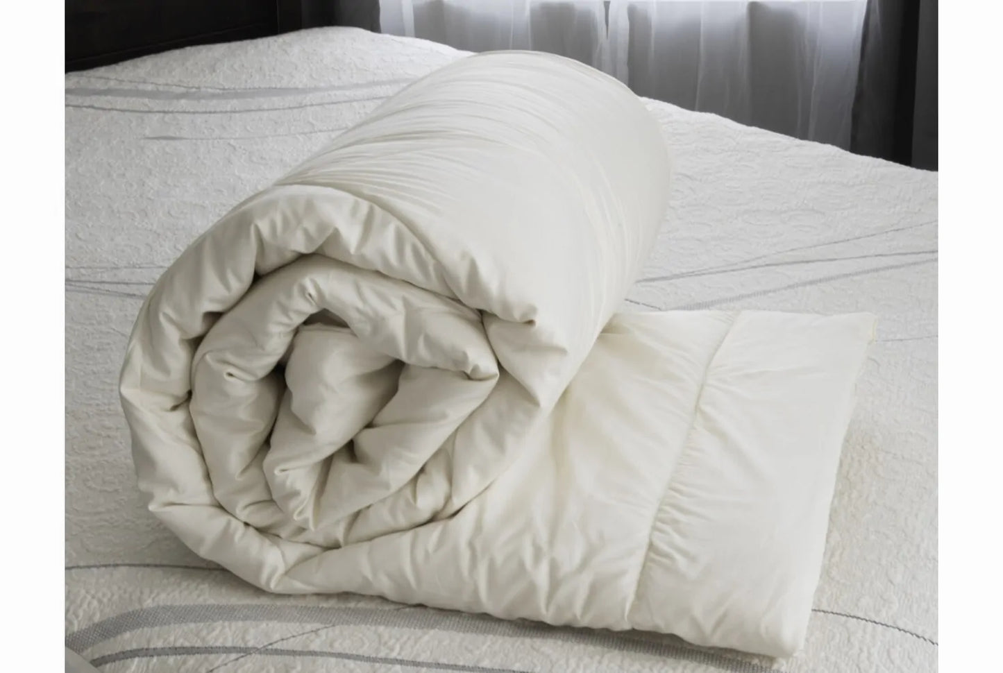This lightweight comforter provides the perfect amount of comfort for sleeping in all seasons or for those who don't need much help keeping warm. The soft sateen cover features 100% GOTS Certified organic cotton quilted to our own American Dream Wool™ from local US farms. This comforter is made with super-washed wool, which allows it to be machine washed in cold without clumping or felting. For best results wash only if needed in cold on delicate and dry flat. You may also tumble dry on air dry or low heat.