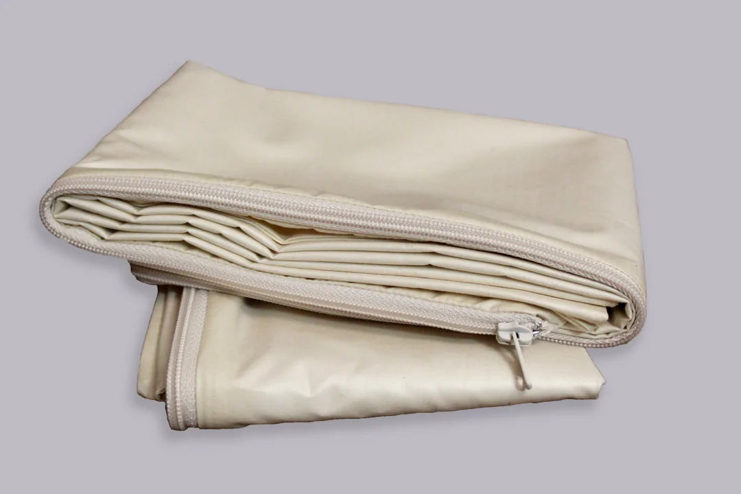 Crescent Moon barrier covers are dust mite-proof encasements for your pillows. They are also recommended for bed-bug protection. These barrier covers are made from 260 TC GOTS certified 100% organic cotton barrier fabric. Dust mites measure from 100 to 300 microns and their feces can be as small as 10 microns which can fall through many fabrics. The organic cotton fabric used for these barrier covers has been lab tested and has an average pore size of 3.8 microns.