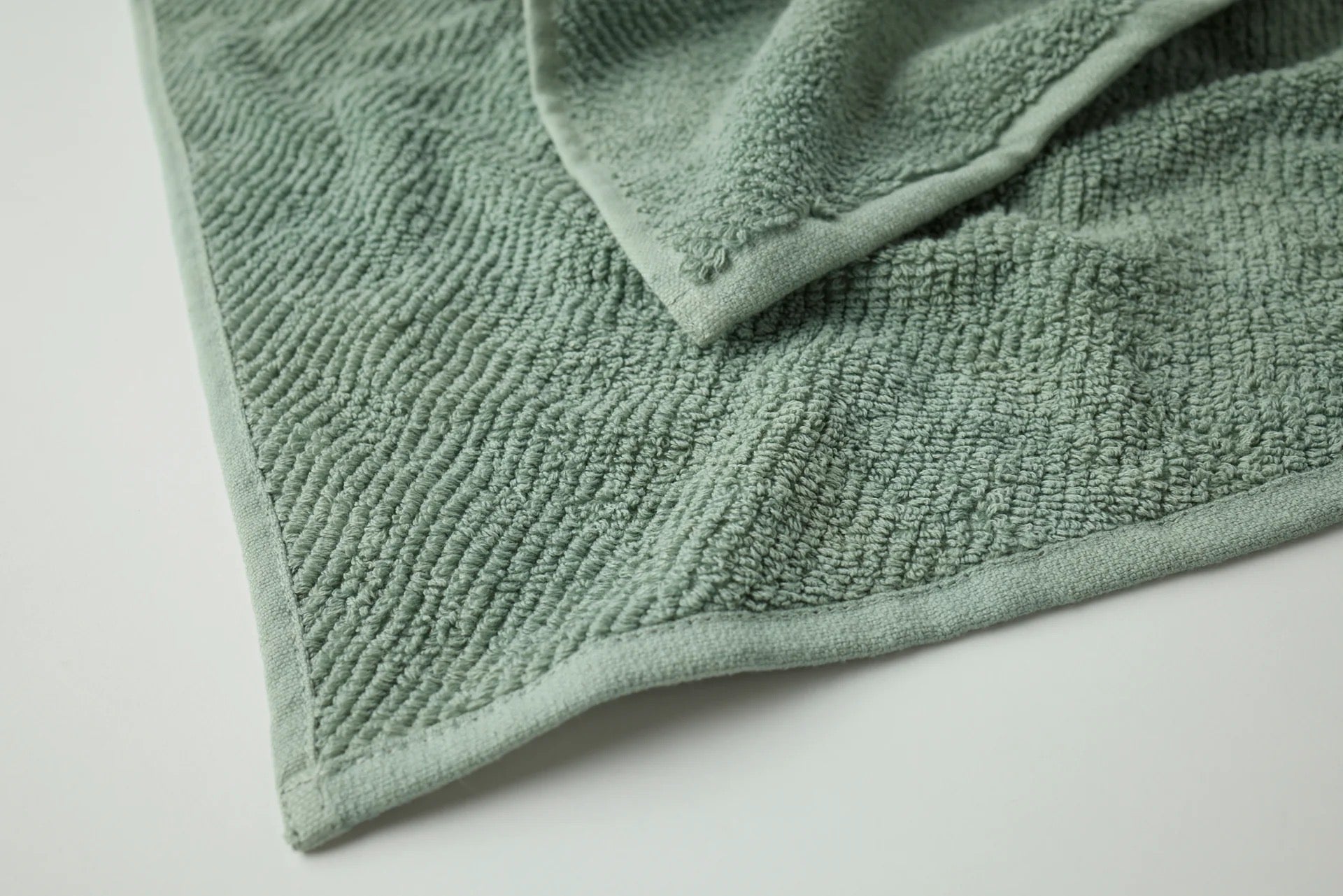 Loomed from long loops of pure organic cotton, our best-selling towel embraces you in the natural performance of premium fibers. A twill weave enhances the natural variations in texture for drying off quickly and efficiently. Durable and dense, Air Weight’s full range of colors elevates your bathroom with superior absorbency that only gets better with time.