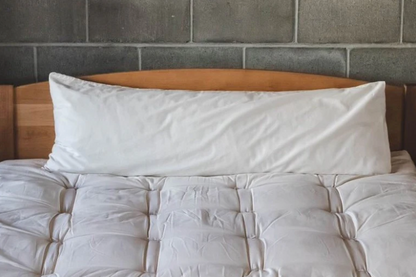 For side sleepers, hugging a body pillow between your legs and arms can provide excellent support and comfort. Utilizing a body pillow can help align your spine, hips, and neck in a neutral position, allowing for a more restful night's sleep and a more comfortable awakening.

Also great for moms-to-be! Pregnancy creates increasing skeletal stress and muscle imbalance as the body works to accommodate the growing weight of the baby. The neutral spine position provided by a body pillow allows the body to relax