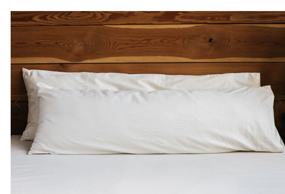 For side sleepers, hugging a body pillow between your legs and arms can provide excellent support and comfort. Utilizing a body pillow can help align your spine, hips, and neck in a neutral position, allowing for a more restful night's sleep and a more comfortable awakening.

Also great for moms-to-be! Pregnancy creates increasing skeletal stress and muscle imbalance as the body works to accommodate the growing weight of the baby. The neutral spine position provided by a body pillow allows the body to relax