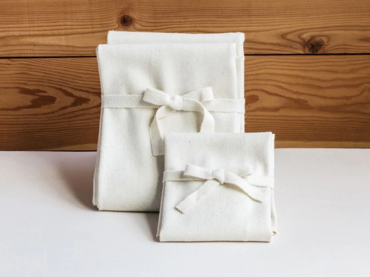 Our 100% natural moisture barrier is created without fillers or additives, making this woven wool textile the perfect chemical-free solution for mattress and topper protection.

The wool is tightly woven and slightly felted, resulting in a naturally water repellent fabric that's a healthy and eco-friendly alternative to synthetic products. The great thing is that it gets even more water repellant as it's washed!