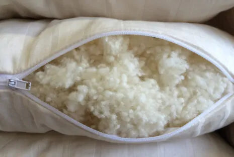 Tailor to your exact comfort preference. All the benefits of wool, plus soft, squishable support similar to a down-feather product. Our most versatile pillow, tiny puffs of wool encased in a zippered case of organic cotton sateen can be adjusted for maximum comfort.

Wool puffs have more substance than down, meaning they can take a shape and hold it. Easily add or remove puffs to fine tune your exact comfort level. Extra puffs available in 3- and 6-oz bags.