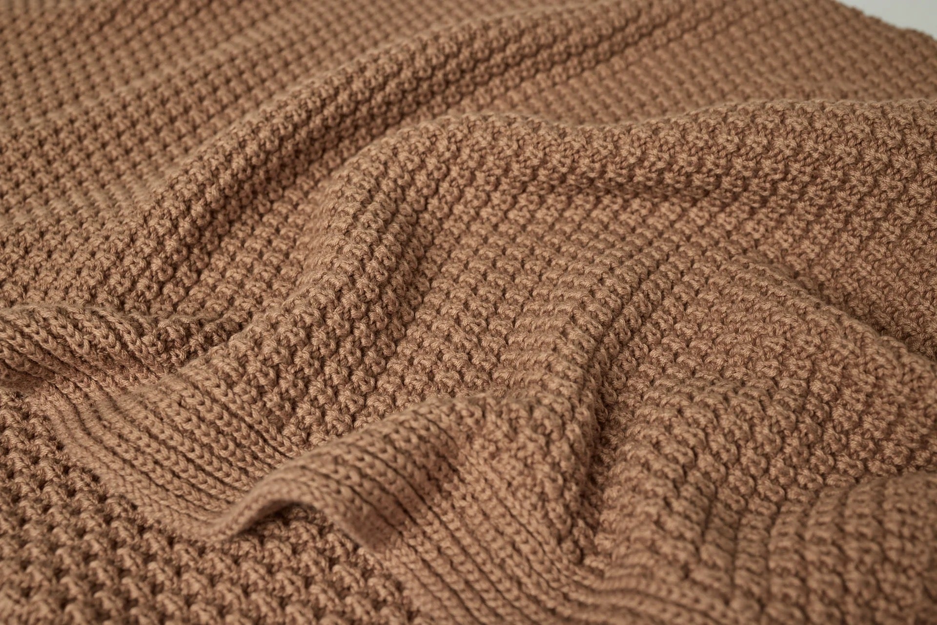 Our Avalon Organic Knit Throw is crafted from the finest 100% organic cotton, offering safe, gentle and breathable comfort. Fair Trade Certified™ means it also helps enhance the quality of life for farmers, factory workers and their families. Inspired by the textures of our coastline, its brioche stitch design delivers a plush feel that’s perfect for layering all season long.