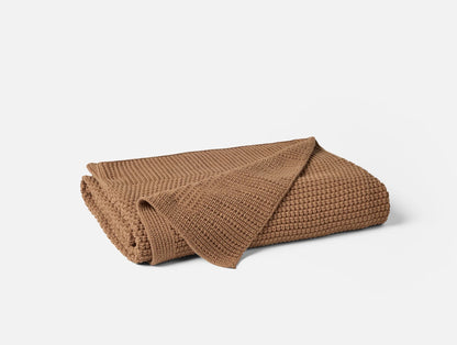 Our Avalon Organic Knit Throw is crafted from the finest 100% organic cotton, offering safe, gentle and breathable comfort. Fair Trade Certified™ means it also helps enhance the quality of life for farmers, factory workers and their families. Inspired by the textures of our coastline, its brioche stitch design delivers a plush feel that’s perfect for layering all season long.