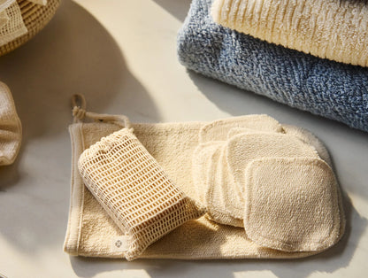 Complete your natural bath ritual with the Bare Organic Bath Mitt. Crafted with 100% organic cotton French terry, the smooth side gently pampers your skin, while the looped side offers light exfoliation. The thoughtful design includes rounded corners for a comfortable fit and a loop for easy hang drying. Fair Trade Certified and undyed to maintain its purest form, the Bare Organic Bath Mitt is a sustainable choice for your self care and the planet. 9"x5"
