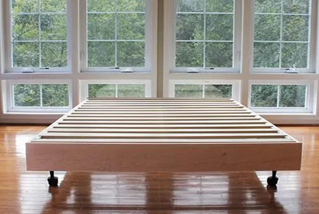 Simple, sturdy support.

Hand-built in our Central Virginia woodshop, our platform bed insert is meant to replace a foundation or box spring. This maple and poplar insert fits inside your bed frame and can even be used to add extra height to an existing platform bed. With fourteen hardwood slats, this insert can provide adequate support and “breathability” to any existing frame.