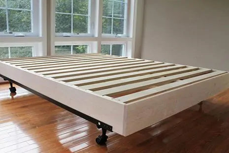 Simple, sturdy support.

Hand-built in our Central Virginia woodshop, our platform bed insert is meant to replace a foundation or box spring. This maple and poplar insert fits inside your bed frame and can even be used to add extra height to an existing platform bed. With fourteen hardwood slats, this insert can provide adequate support and “breathability” to any existing frame.