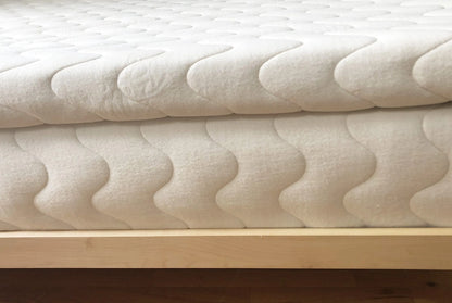 The Bella Sera Natural Latex Mattress Topper is a great option when you’re looking to add cushion to a mattress that’s a little firm, or to achieve an extra plush feel on softer mattresses. It’s made with two inches of soft GOLS certified organic Dunlop latex surrounded by a quilted organic cotton and organic wool cover. Your comfort preference can change over time, and adding a topper can be smart way to adjust the feel of your mattress.