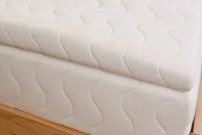 The Bella Sera Natural Latex Mattress Topper is a great option when you’re looking to add cushion to a mattress that’s a little firm, or to achieve an extra plush feel on softer mattresses. It’s made with three inches of GOLS certified organic Dunlop latex (choose your firmness) surrounded by a quilted organic cotton and organic wool cover. Your comfort preference can change over time, and adding a topper can be smart way to adjust the feel of your mattress.
