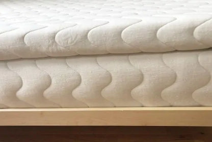 The Bella Sera Natural Latex Mattress Topper is a great option when you’re looking to add cushion to a mattress that’s a little firm, or to achieve an extra plush feel on softer mattresses. It’s made with three inches of GOLS certified organic Dunlop latex (choose your firmness) surrounded by a quilted organic cotton and organic wool cover. Your comfort preference can change over time, and adding a topper can be smart way to adjust the feel of your mattress.