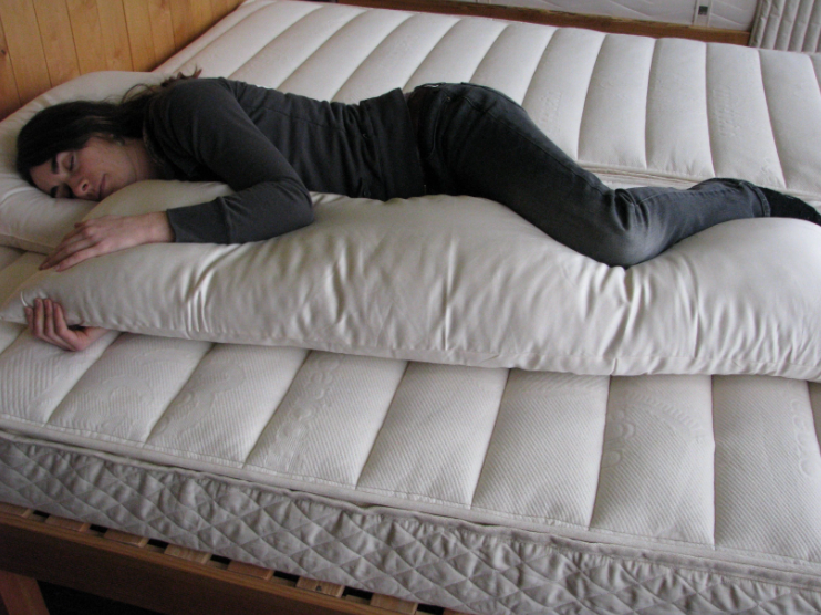 For side sleepers, hugging a body pillow can provide excellent support and comfort, alleviating the potential for hip, shoulder and neck pain. Utilizing a body pillow can help align your spine, hips and neck in a neutral position, allowing for a more restful night's sleep.

Also great for moms-to-be. Pregnancy creates increasing skeletal stress and muscle imbalance as the body works to accommodate the growing weight of a baby. The neutral spine position provided by a body pillow allows the body to relax,