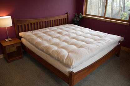 Encased in GOTS-certified organic cotton sateen and filled with GOTS-certified wool, our quilted toppers are designed to sit atop your existing mattress. With organic wool sustainably sourced from New Zealand, these toppers provide a comfortable, breathable sleep surface that naturally regulates body temperature. Adding a topper allows you to fine-tune your sleep system to your comfort preference.