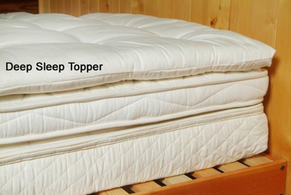 Encased in GOTS-certified organic cotton sateen and filled with GOTS-certified wool, our quilted toppers are designed to sit atop your existing mattress. With organic wool sustainably sourced from New Zealand, these toppers provide a comfortable, breathable sleep surface that naturally regulates body temperature. Adding a topper allows you to fine-tune your sleep system to your comfort preference.