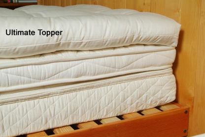 Encased in GOTS-certified organic cotton sateen and filled with GOTS-certified wool, our quilted toppers are designed to sit atop your existing mattress. With organic wool sustainably sourced from New Zealand, these toppers provide a comfortable, breathable sleep surface that naturally regulates body temperature. Adding a topper allows you to fine-tune your sleep system to your comfort preference.