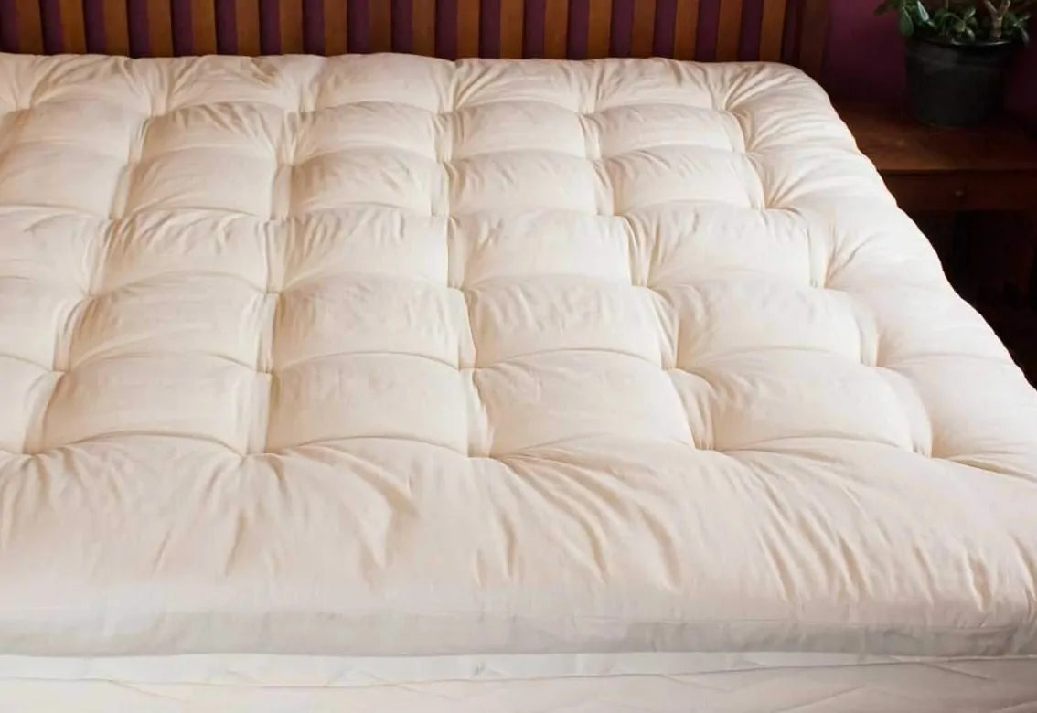 Encased in GOTS-certified organic cotton sateen and filled with GOTS-certified wool, our quilted toppers are designed to sit atop your existing mattress. With organic wool sustainably sourced from New Zealand, these toppers provide a comfortable, breathable sleep surface that naturally regulates body temperature. Adding a topper allows you to fine-tune your sleep system to your comfort preference.

Wool is naturally hypoallergenic, dust-mite resistant, anti-microbial and anti-bacterial, and inherently fire 