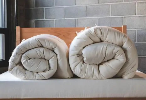 Encased in GOTS-certified organic cotton sateen and filled with GOTS-certified wool, our quilted toppers are designed to sit atop your existing mattress. With organic wool sustainably sourced from New Zealand, these toppers provide a comfortable, breathable sleep surface that naturally regulates body temperature. Adding a topper allows you to fine-tune your sleep system to your comfort preference.

Wool is naturally hypoallergenic, dust-mite resistant, anti-microbial and anti-bacterial, and inherently fire 