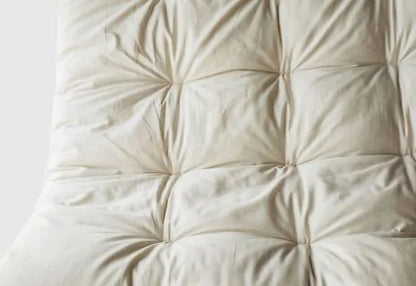 Encased in GOTS-certified organic cotton sateen and filled with GOTS-certified wool, our quilted toppers are designed to sit atop your existing mattress. With organic wool sustainably sourced from New Zealand, these toppers provide a comfortable, breathable sleep surface that naturally regulates body temperature. Adding a topper allows you to fine-tune your sleep system to your comfort preference.

Wool is naturally hypoallergenic, dust-mite resistant, anti-microbial and anti-bacterial, and inherently fire 