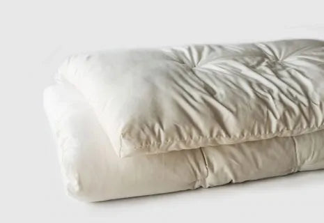 Encased in GOTS-certified organic cotton sateen and filled with GOTS-certified wool, our quilted toppers are designed to sit atop your existing mattress. With organic wool sustainably sourced from New Zealand, these toppers provide a comfortable, breathable sleep surface that naturally regulates body temperature. Adding a topper allows you to fine-tune your sleep system to your comfort preference.

Wool is naturally hypoallergenic, dust-mite resistant, anti-microbial and anti-bacterial, and inherently fire 