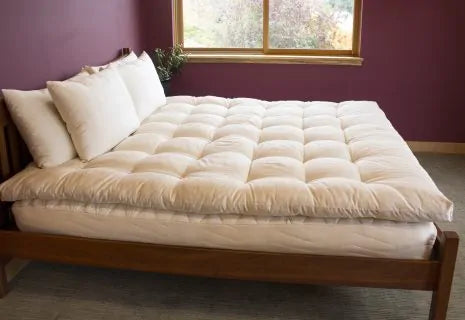 Encased in GOTS-certified organic cotton sateen and filled with GOTS-certified wool, our quilted toppers are designed to sit atop your existing mattress. With organic wool sustainably sourced from New Zealand, these toppers provide a comfortable, breathable sleep surface that naturally regulates body temperature. Adding a topper allows you to fine-tune your sleep system to your comfort preference.

Wool is naturally hypoallergenic, dust-mite resistant, anti-microbial and anti-bacterial, and inherently fire 