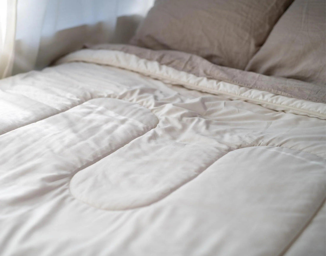 Our organic wool is complimented by our beautiful sateen organic cotton covers with a 260 thread count. The thread count not only complements the wool function but also allows airflow, and longevity and prevents felting. This soft silky cotton is GOTS Certified (Global Organic Textile Standards) and was grown and picked in Turkey.