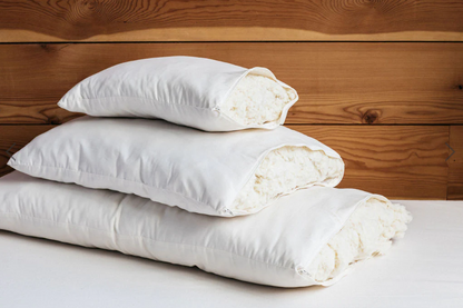 All the benefits of wool, plus soft, squishable support similar to a down-feather product. Our most versatile pillow, tiny puffs of wool encased in a zippered case of organic cotton sateen can be adjusted for maximum comfort.

Wool puffs have more substance than down, meaning they can take a shape and hold it. You can easily add or remove puffs to tailor this pillow to your growing child's support and comfort needs.