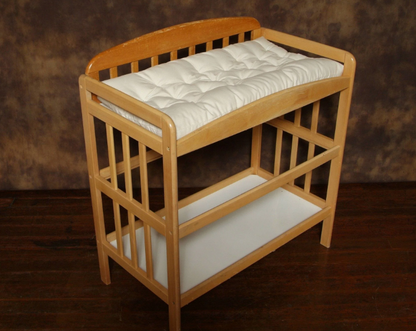 A comfy and secure all-natural alternative. Smartly designed with contoured sides to support and nestle baby right in the center. Quilted for plushness and comfort. Made with premium eco wool encased in organic cotton canvas.
