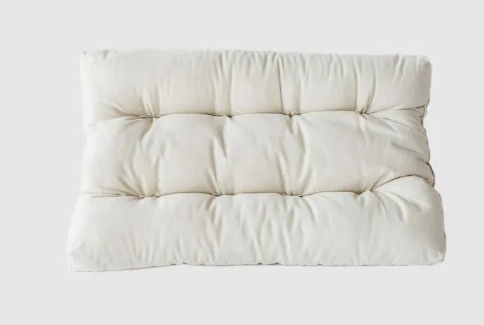 Developed in partnership with a chiropractic physician, this unique design allows your head to rest on a flat surface while your neck stays properly supported and in cervical alignment with your spine.

With a neck bolster along each long edge, one stuffed slightly more than the other, you can choose the exact amount of support you need. Made with Premium Eco Wool and 100% Organic Cotton, you also get the added benefits of temperature regulation and dust-mite resistance.