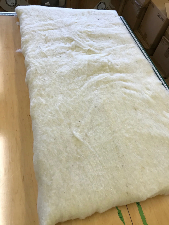 Elevate your sleep experience with our cushiony, all-natural mattress topper created from the purest latex wrapped in the finest wool. The best of both worlds in one luxurious package. The topper is made with 2" of GOLS-certified Dunlop latex, wrapped in our exceptional Premium Eco Wool and encased in GOTS-certified organic cotton sateen. The result is a 3"-deep topper that's super comfortable, durable, and free of chemicals and synthetic additives. The topper is rated an ILD of 25, or "soft."
