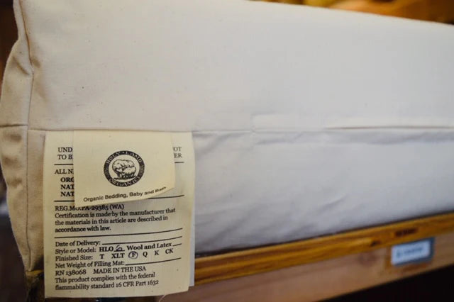 All natural, cushiony comfort from a 6" core of latex surrounded by a layer of durable Premium Eco Wool encased in organic cotton canvas. The canvas encasement is the perfect fit for a latex mattress, durable and soft to the touch. The result is a firm and supportive base layer (ILD rating of 28), perfect for a restful night's sleep. Wool's natural fire retardant properties mean no chemicals in this mattress.