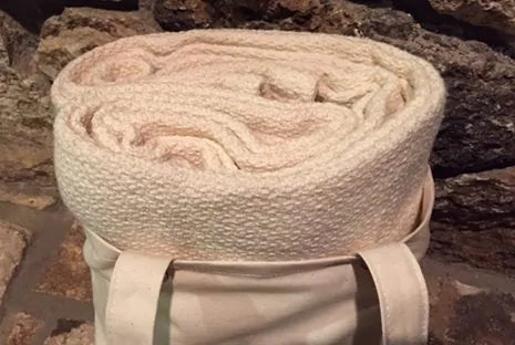 Crafted from GOTS certified organic cotton, the Crepe Weave Blanket by Organics and More offers timeless appeal with its simple yet elegant design. Never dyed or treated, this blanket provides a healthy and attractive bedding option. Lightweight and versatile, it’s ideal for both cool summer nights and winter layering. Skillfully constructed with hemmed edges, it withstands repeated washes while maintaining its quality. Available in a natural ivory color, this blanket exudes understated beauty and eco-frien