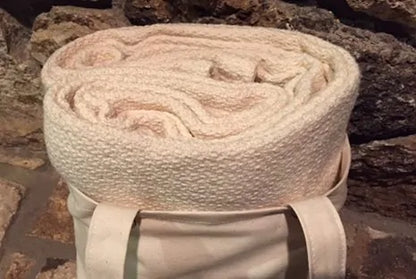 Crafted from GOTS certified organic cotton, the Crepe Weave Blanket by Organics and More offers timeless appeal with its simple yet elegant design. Never dyed or treated, this blanket provides a healthy and attractive bedding option. Lightweight and versatile, it’s ideal for both cool summer nights and winter layering. Skillfully constructed with hemmed edges, it withstands repeated washes while maintaining its quality. Available in a natural ivory color, this blanket exudes understated beauty and eco-frien