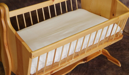 The perfect addition to keep baby sleeping comfy, safe, and sound. Protect your bassinet mattress with our handmade fitted sheet. Organic cotton sateen with cotton elastic sewn in all around the edges for a snug, secure fit. Machine washable and easy to care for. Intended for use with mattresses measuring 18" x 35" x 2.5".